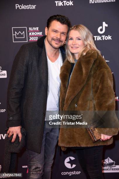 And his wife Anna Tanneberger) attend the 1Live Krone 2022 at Jahrhunderthalle on December 8, 2022 in Bochum, Germany.