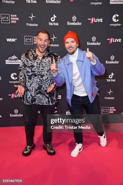 Dennis Wolter and Benjamin Wolter aka World Wide Wohnzimmer attend the 1Live Krone 2022 at Jahrhunderthalle on December 8, 2022 in Bochum, Germany.