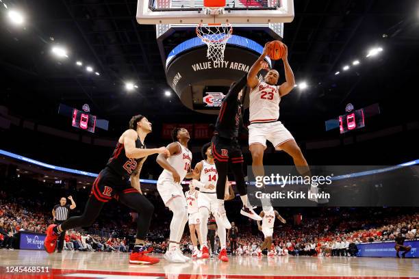 Zed Key of the Ohio State Buckeyes beats Paul Mulcahy of the Rutgers Scarlet Knights to the rebound during the second half of the game at the Jerome...