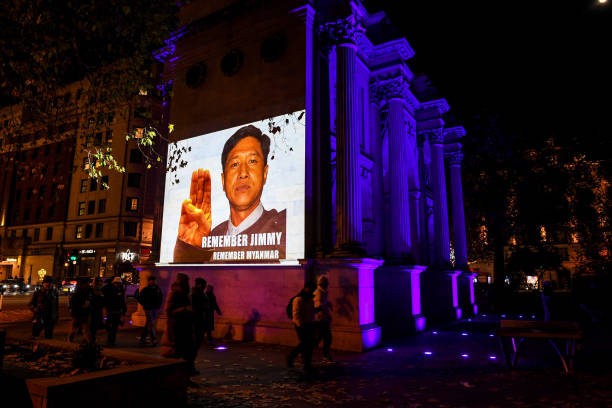 GBR: Highlighting Rights: Marble Arch And UK Parliament Light Up With Image Of Myanmar Dissident To Mark World Human Rights Day