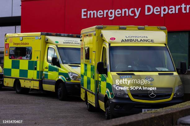 Ambulances belonging to the London Ambulance Service are parked at St. Thomas' Hospital. More than 10,000 NHS ambulance staff from nine NHS hospital...