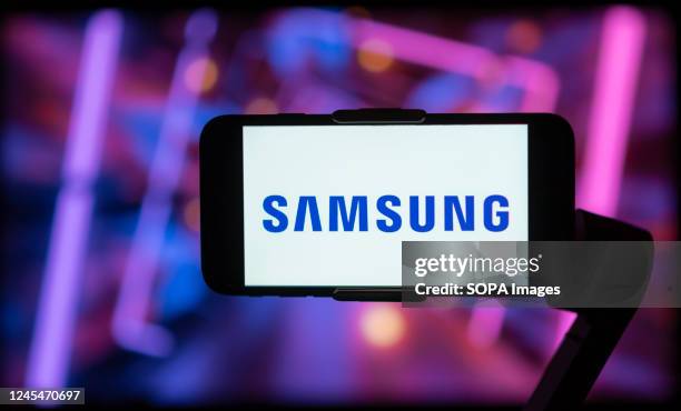 In this photo illustration, a logo of Samsung mobile company is seen on a mobile phone screen.