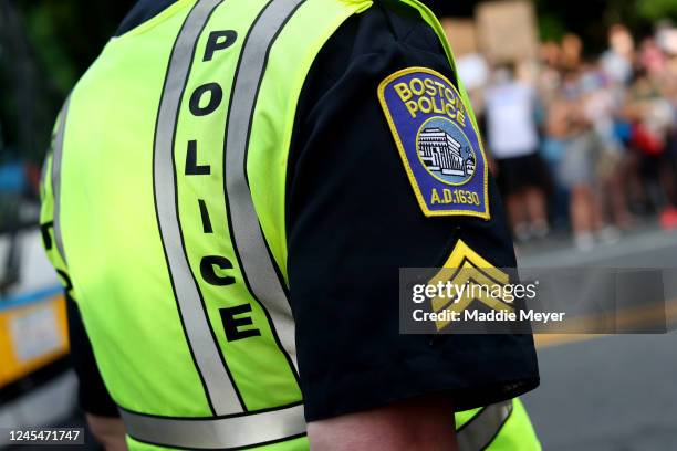 Boston Police Officer stands beside a protest on June 04, 2020 in Boston, Massachusetts. The protests were in response to the death of George Floyd,...