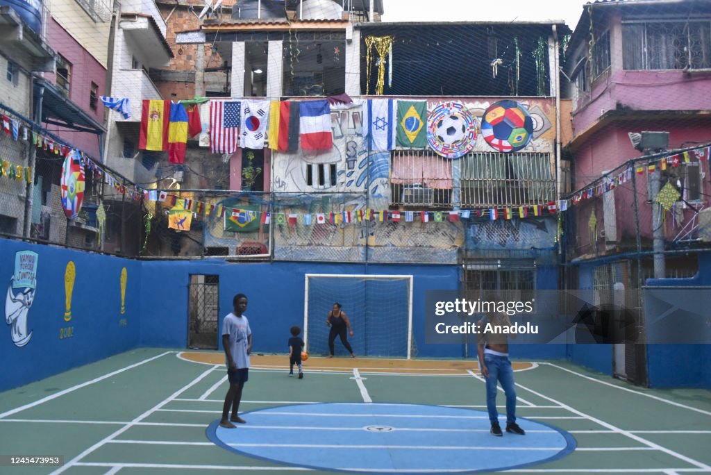 Teenagers play soccer in favela of Rio de Janeiro, Brazil