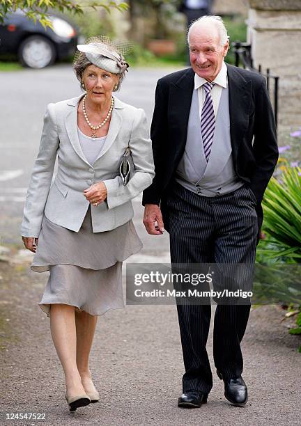 Patti Palmer-Tomkinson and Charles Palmer-Tomkinson attend the wedding of Ben Elliot and Mary-Clare Winwood at the church of St. Peter and St. Paul,...