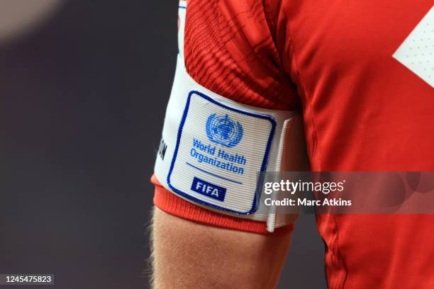 The logo of the World Health organisation is seen on a captains armband worn by Gareth Bale of Wales during the FIFA World Cup Qatar 2022 Group B...