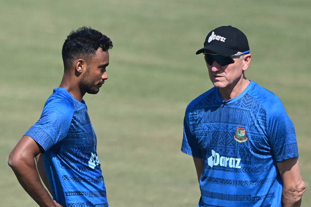 Bangladeshs Shoriful Islam talks to fast bowling coach Allan Donald during a practice session at the Zahur Ahmed Chowdhury Stadium in Chattogram on...