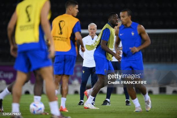 France's coach Didier Deschamps oversees a training session at Al Sadd SC Stadium in Doha, on December 9 on the eve of the Qatar 2022 World Cup...