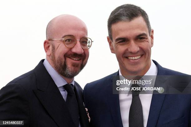 Spain's Prime Minister Pedro Sanchez welcomes European Council President Charles Michel during the EU-MED9 Euro-Mediterranean Group Summit on...