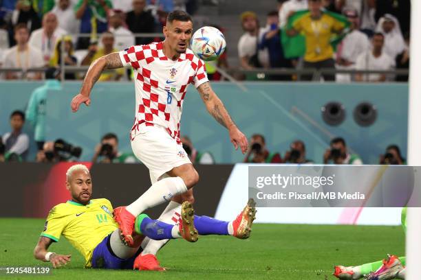 Neymar of Brazil and Dejan Lovren of Croatia in action during the FIFA World Cup Qatar 2022 quarter final match between Croatia and Brazil at...