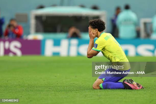 Marquinhos of Brazil reacts after missing his penalty and Brazil being eliminated during the FIFA World Cup Qatar 2022 quarter final match between...