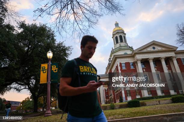 Student walks on the Baylor University campus in Waco, Texas on December 8, 2022 where Brittney Griner was a former student and basketball player. -...