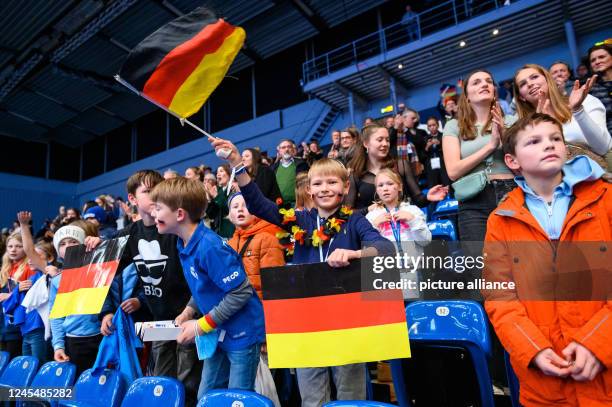 December 2022, Hamburg: Hockey/Hall, Women: European Championship, Germany - Czech Republic, preliminary round, Group A, Matchday 5. A young fan of...