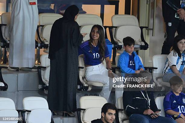 Argentina's forward Lionel Messi's wife Antonela Roccuzzo , children and father Jorge Messi attend the Qatar 2022 World Cup quarter-final football...