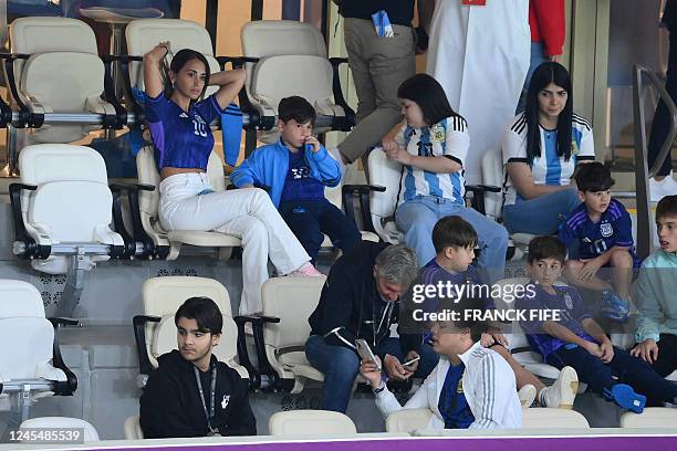 Argentina's forward Lionel Messi's wife Antonela Roccuzzo , children and father Jorge Messi attend the Qatar 2022 World Cup quarter-final football...