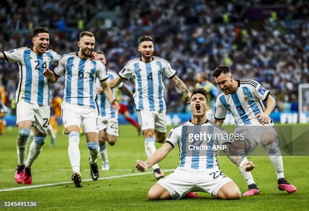 Lautaro Martinez of Argentina cheers after the decisive penalty during the FIFA World Cup Qatar 2022 quarterfinal match between the Netherlands and...