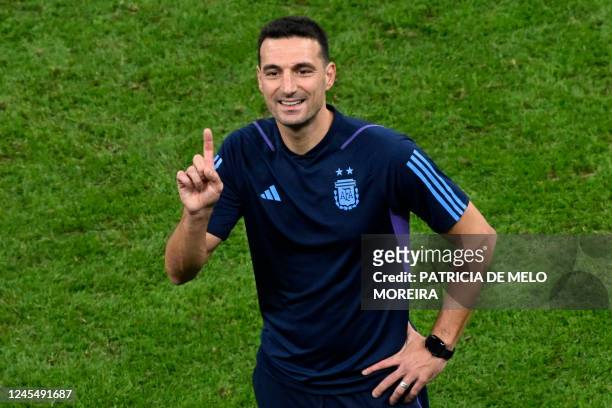 Argentina's coach Lionel Scaloni celebrates after his team won the Qatar 2022 World Cup quarter-final football match between The Netherlands and...