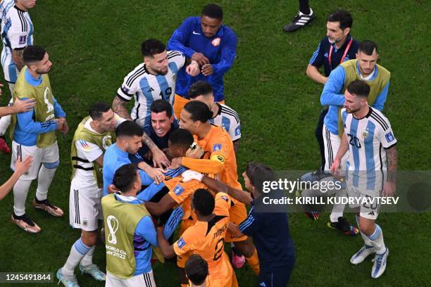 Netherlands and Argentina players clash during the Qatar 2022 World Cup quarter-final football match between The Netherlands and Argentina at Lusail...