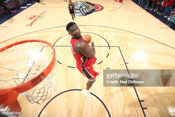 Zion Williamson of the New Orleans Pelicans dunks the ball during the game against the Phoenix Suns on December 9, 2022 at the Smoothie King Center...