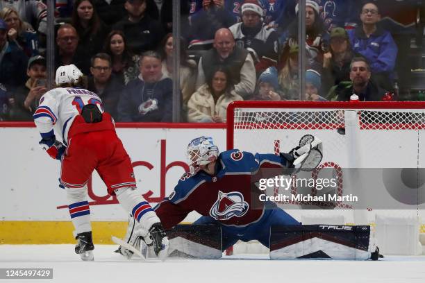 Artemi Panarin of the New York Rangers scores the game-winning goal in a penalty shootout against the Colorado Avalanche at Ball Arena on December 9,...