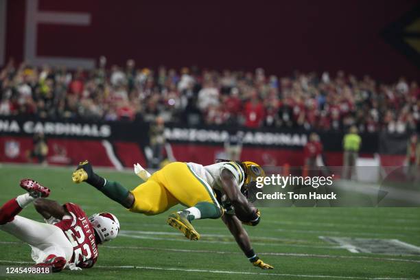 Arizona Cardinals strong safety Tony Jefferson and Green Bay Packers running back Eddie Lacy in action during an NFL NFC Divisional Playoff football...