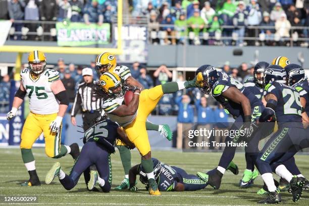 Green Bay Packers running back Eddie Lacy runs with the ball at the 2015 NFC Championship game between the Seattle Seahawks against the Green Bay...