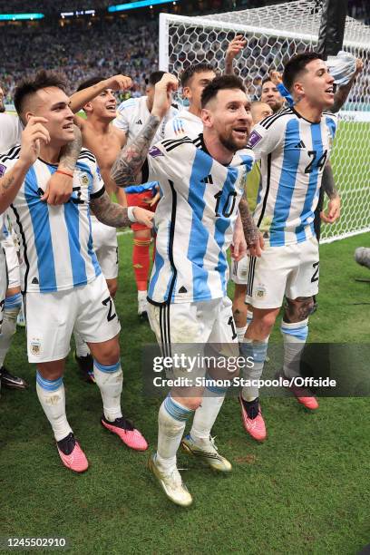 Lionel Messi of Argentina and his teammates velebrate victory after the FIFA World Cup Qatar 2022 quarter final match between Netherlands and...