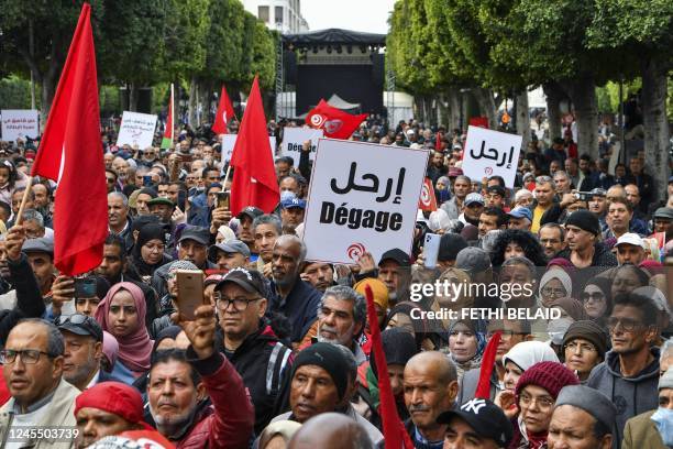 Tunisian demonstrators take part in a rally against President Kais Saied, called for by the opposition "National Salvation Front" coalition, in the...