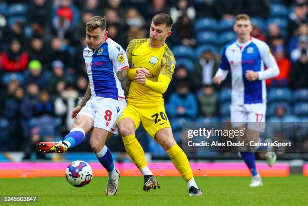 Blackburn Rovers' Sammie Szmodics battles with Preston North End's Ben Woodburn during the Sky Bet Championship between Blackburn Rovers and Preston...