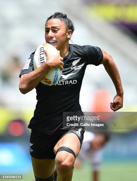 Risi Pouri-Lane of New Zealand scores a try during the match between New Zealand and Fiji on day 2 of the HSBC Cape Town Sevens at DHL Stadium on...