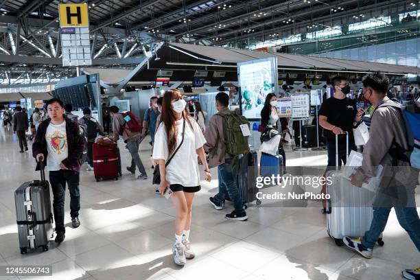 Foreign tourists at the passenger terminal at the Suvarnabhumi International Airport in Samut Prakan province, Thailand, 10 December, 2022. Thailand...