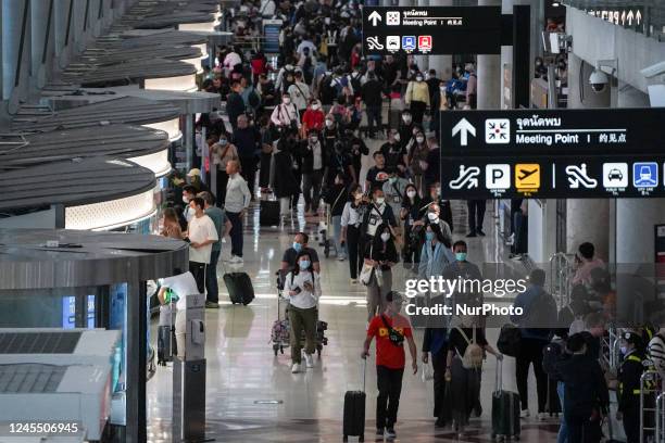 Foreign tourists at the passenger terminal at the Suvarnabhumi International Airport in Samut Prakan province, Thailand, 10 December, 2022. Thailand...