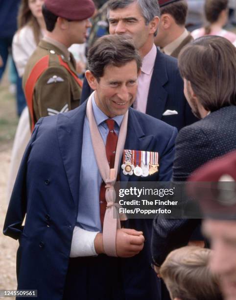 Prince Charles meeting Parachute Regiment veterans on Airborne Forces Day at Rushmoor Arena in Aldershot, England in July 1990.