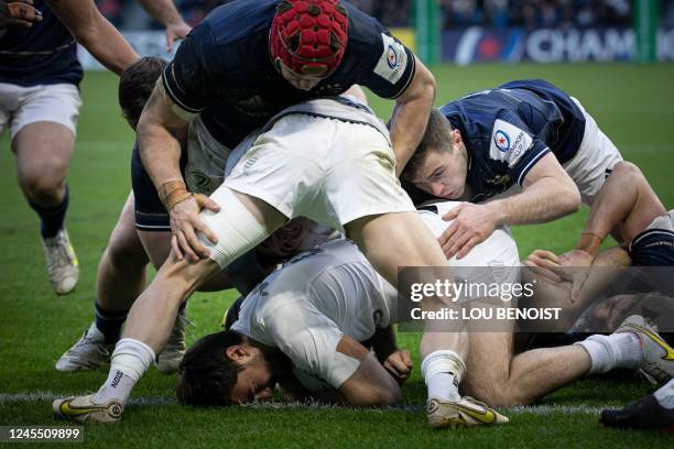 Racing92's French centre Olivier Klemenczak protects the ball in a ruck during the European Rugby Champions Cup pool A rugby union match between...