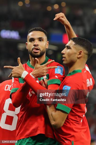 Youssef En-Nesyri of Morocco celebrates scoring the first goal with his team-mate Achraf Hakimi during the FIFA World Cup Qatar 2022 quarter final...