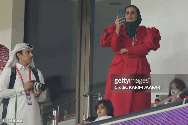 Sheikha Al-Mayassa bint Hamad bin Khalifa attends the Qatar 2022 World Cup quarter-final football match between Morocco and Portugal at the...