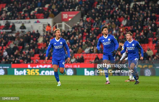 Callum Robinson of Cardiff City FC scores during the Sky Bet Championship between Stoke City and Cardiff City at Bet365 Stadium on December 10, 2022...