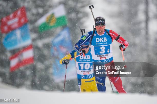 Quentin Fillon Maillet of France, Sebastian Samuelsson of Sweden in action competes during the Men 4x7.5 km Relay at the BMW IBU World Cup Biathlon...