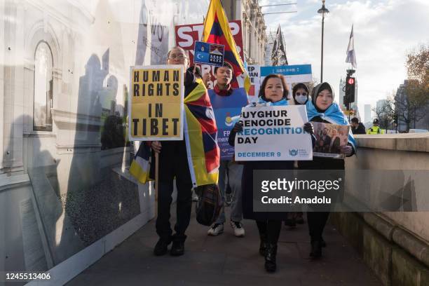 Hongkongers, Tibetans, Uyghur Muslims and their supporters march through central London against the Chinese Communist Party on World Human Rights Day...