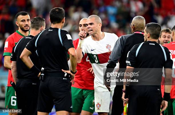 Pepe of Portugal argues with the referee Facundo Tello after the defeat ,during the FIFA World Cup Qatar 2022 quarter final match between Morocco and...