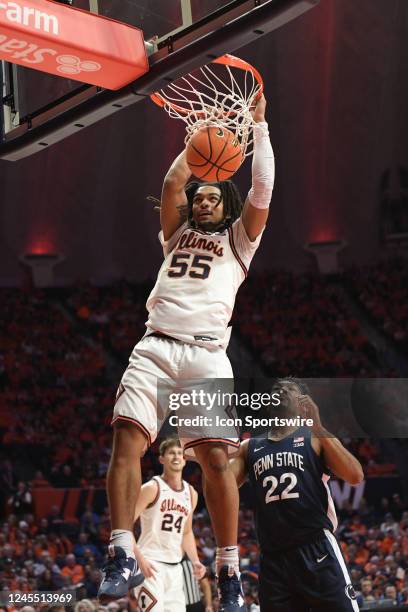 Skyy Clark guard University of Illinois Fighting Illini watches his jam go through the net against the Penn State University Nittany Lions in a Big...