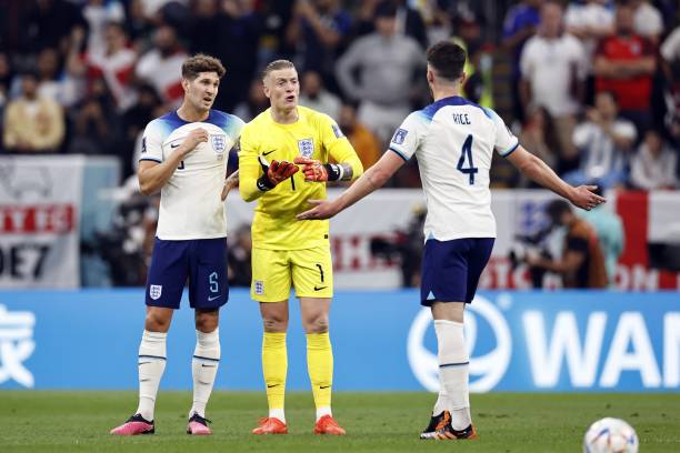 John Stones of England, England goalkeeper Jordan Pickford, Declan Rice of England disappointed after the 0-1 during the FIFA World Cup Qatar 2022...