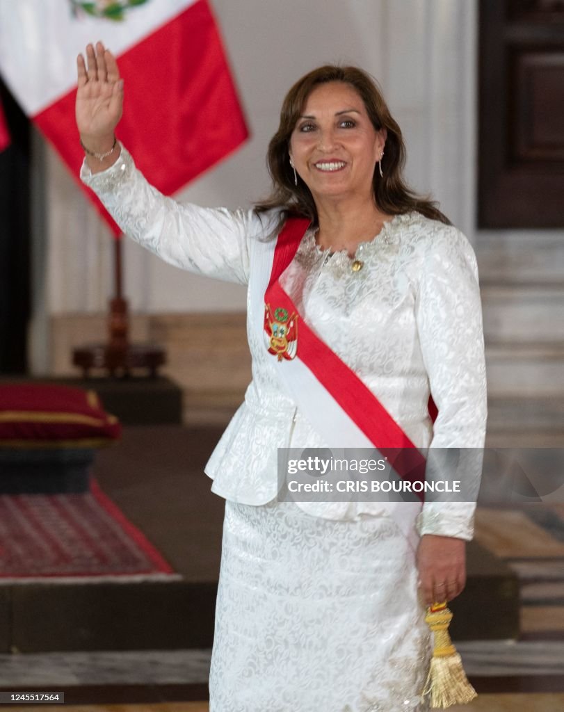 Peru Ruler Peru's new President, Dina Boluarte, waves after the swearing-in ...