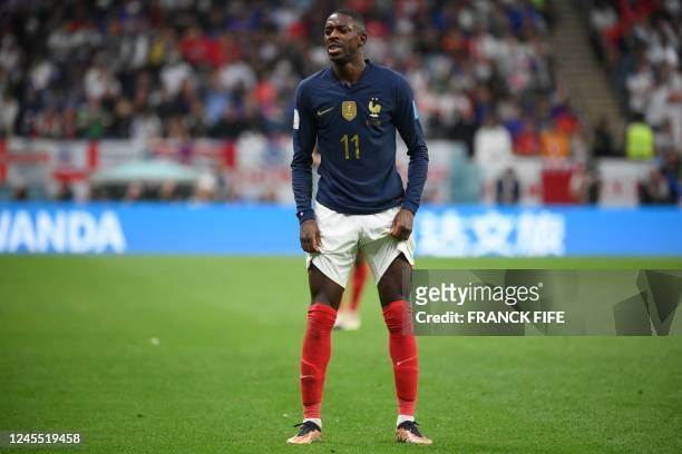 France's forward Ousmane Dembele reacts during the Qatar 2022 World Cup quarter-final football match between England and France at the Al-Bayt...