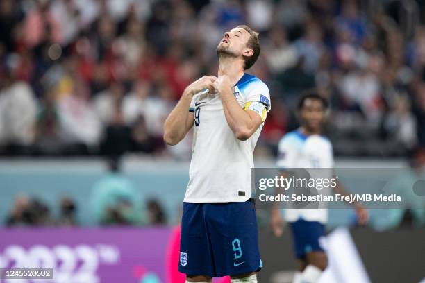 Harry Kane of England shows a look of dejection during the FIFA World Cup Qatar 2022 quarter final match between England and France at Al Bayt...