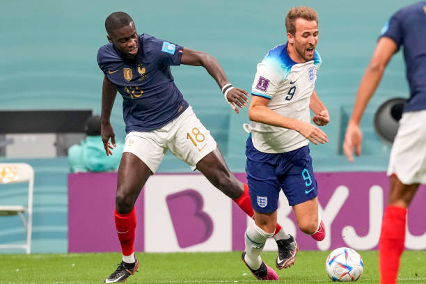 England player Harry Kane and France player Dayot Upamecano during the FIFA World Cup 2022, Quarterfinal match between France and England at Al Bayt...