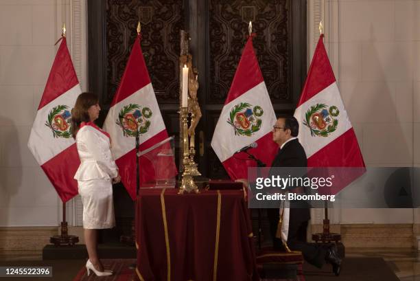 Dina Boluarte, Peru's president, left, and Luis Alberto Otarola, Peru's new defense minister, attend a cabinet swearing in ceremony at the Government...