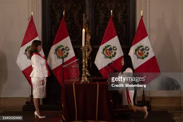 Dina Boluarte, Peru's president, left, and Albina Ruiz Rios, Peru's new environment minister, attenda cabinet swearing in ceremony at the Government...