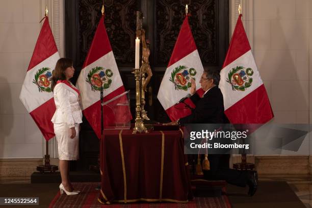 Dina Boluarte, Peru's president, left, and Oscar Vera Gargurevich, Peru's new energy and mine minister, during a cabinet swearing in ceremony at the...