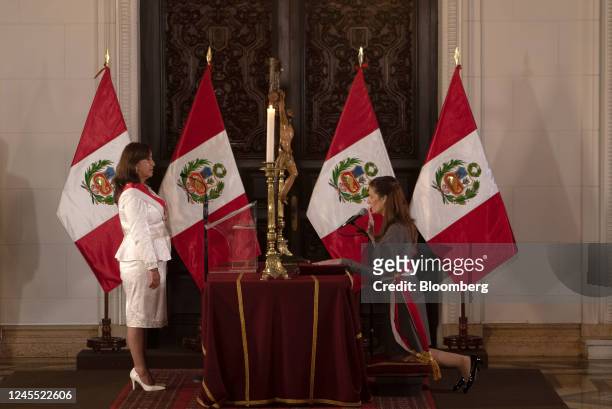 Dina Boluarte, Peru's president, left, and Hania Perez de Cuellar, Peru's new housing minister, during a cabinet swearing in ceremony at the...